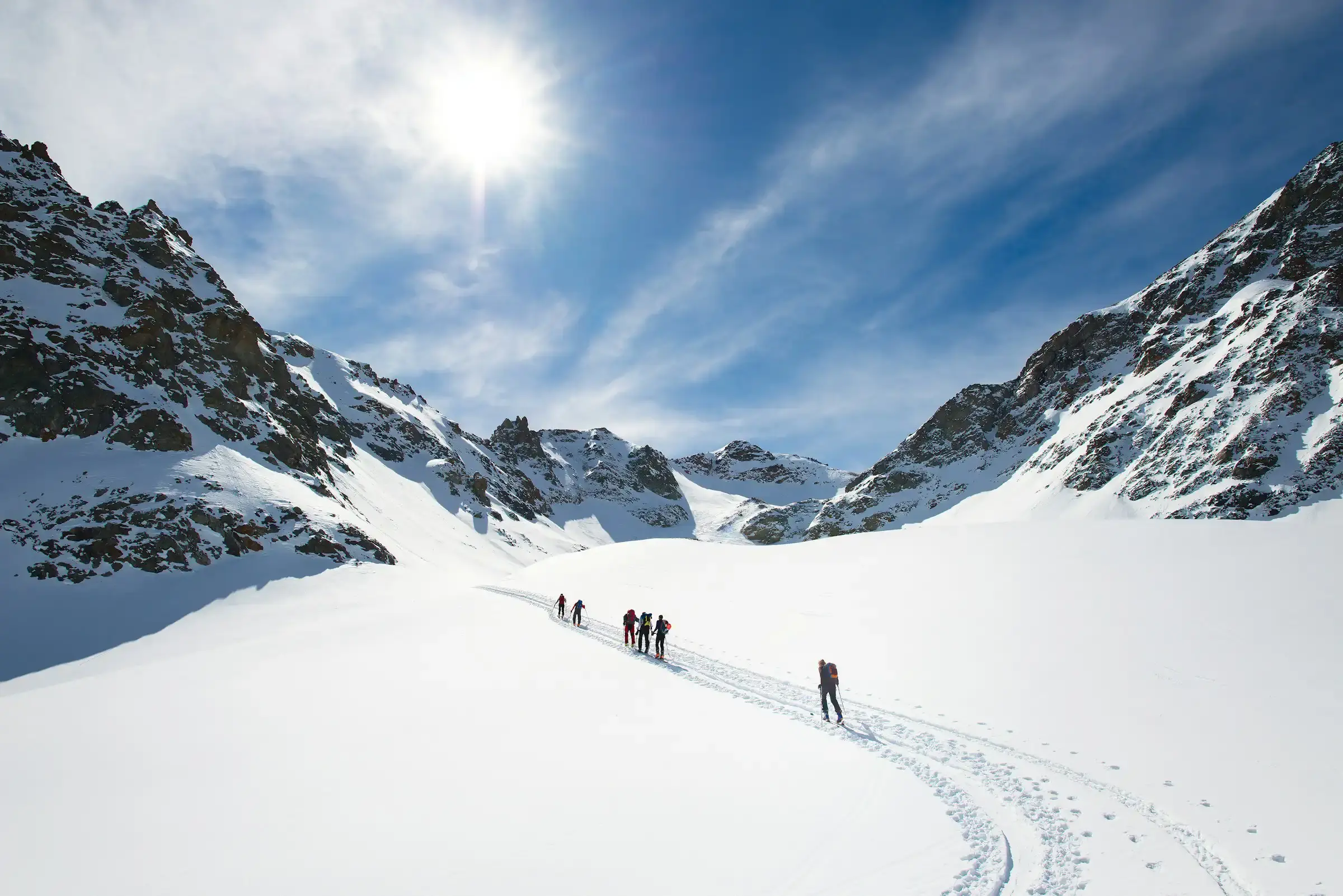 Hikers walking up trail